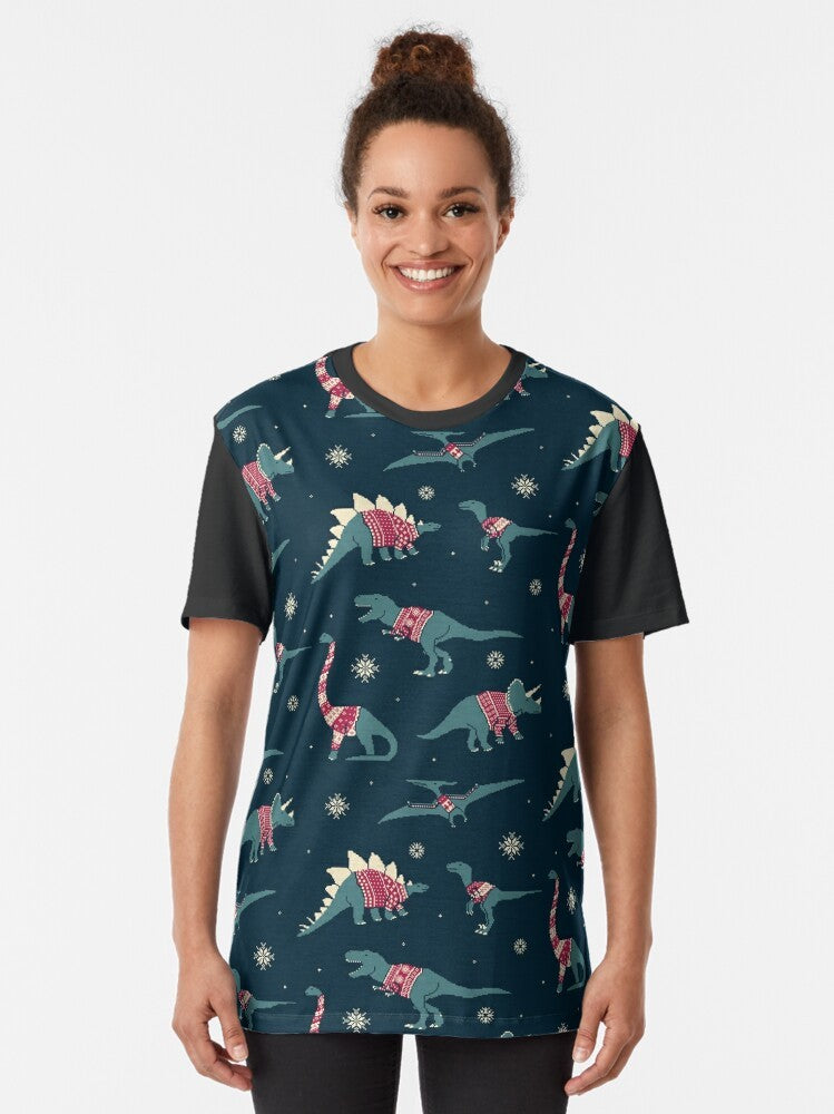 Graphic tee featuring cute dinosaurs wearing festive holiday sweaters - Women