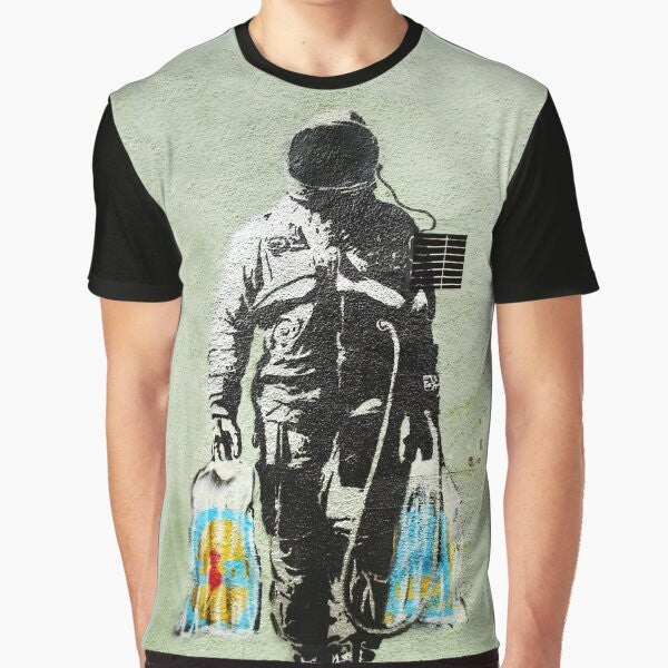 Banksy-inspired graphic t-shirt featuring an astronaut carrying shopping bags, a commentary on consumerism and society.