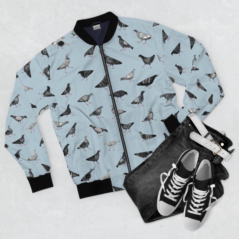 Bomber jacket featuring a pattern of urban pigeons/doves in shades of gray - Flat lay