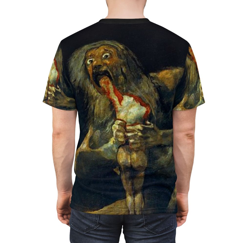 Vintage-style graphic tee featuring Francisco Goya's iconic painting "Saturn Devouring His Son". - men back