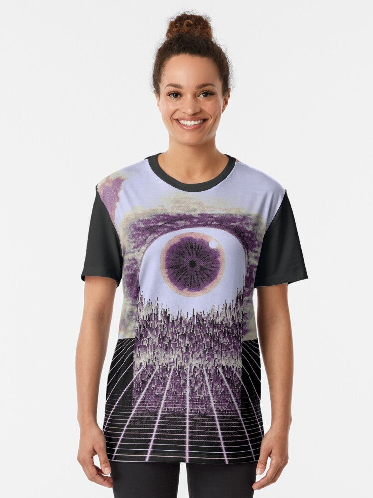 "Virtual Emptiness" surreal glitch art t-shirt featuring a distorted, pixelated eye against a wired, cloud-filled sky background - Women