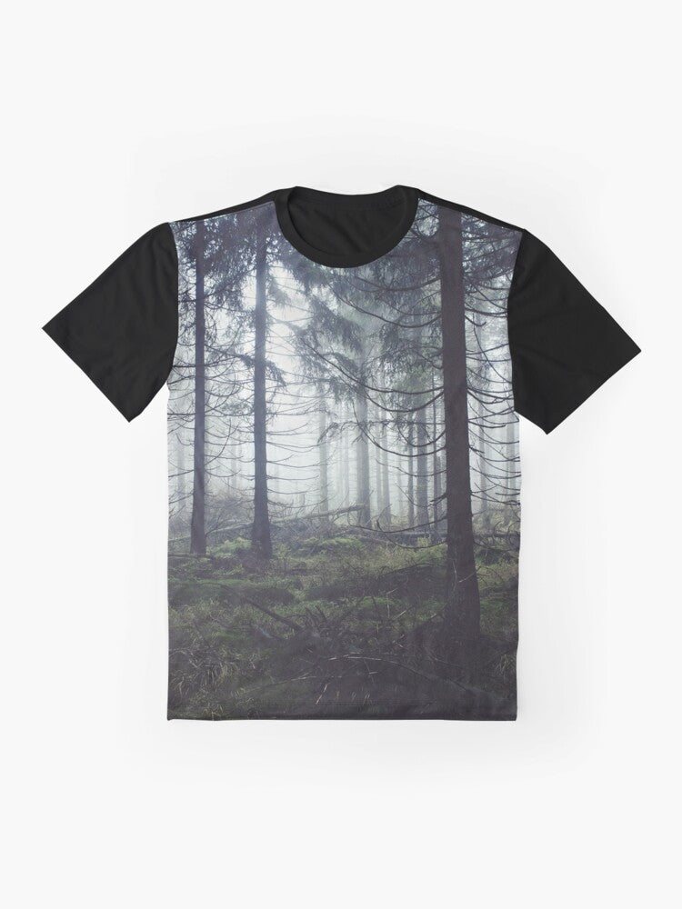 A vintage-inspired graphic t-shirt featuring a misty, foggy forest landscape with trees and mountains, perfect for nature and adventure lovers. - Flat lay