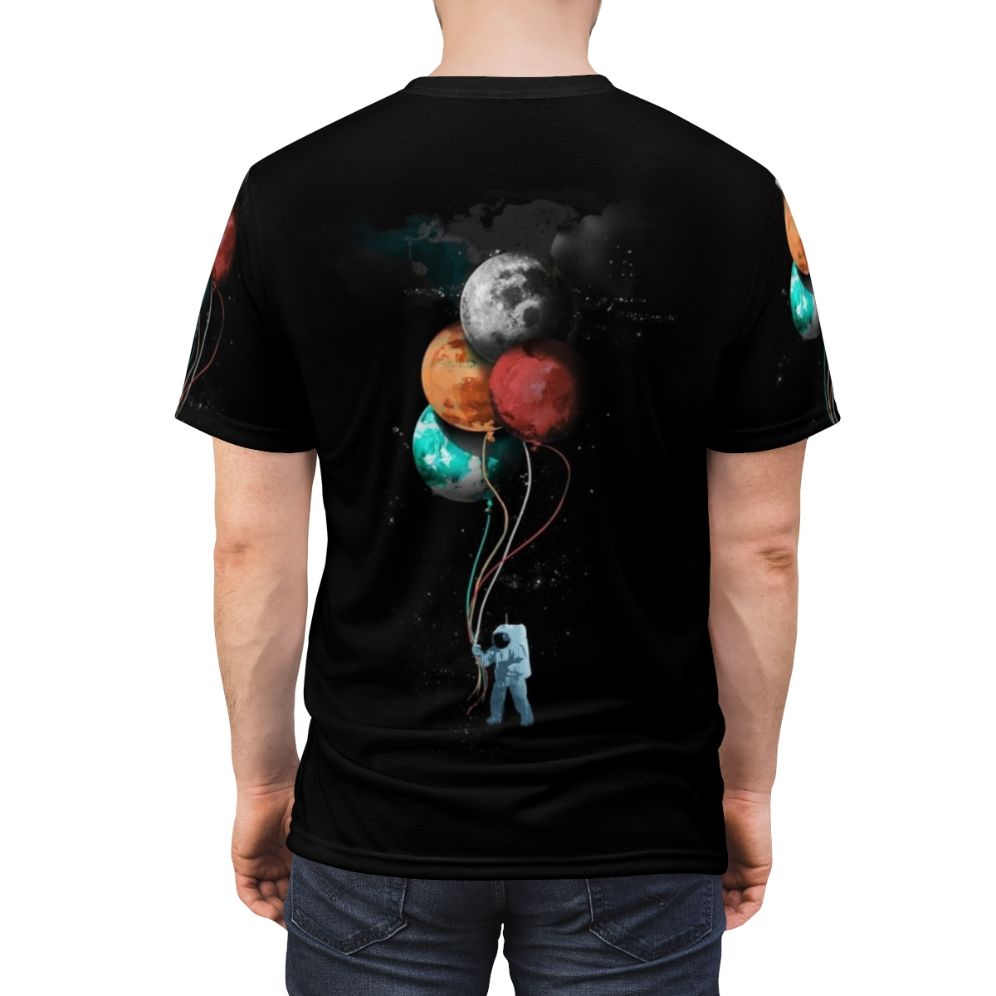 Cosmic Spaceman T-Shirt with a surreal, artsy space design featuring a spaceman, planets, and floating balloons - men back