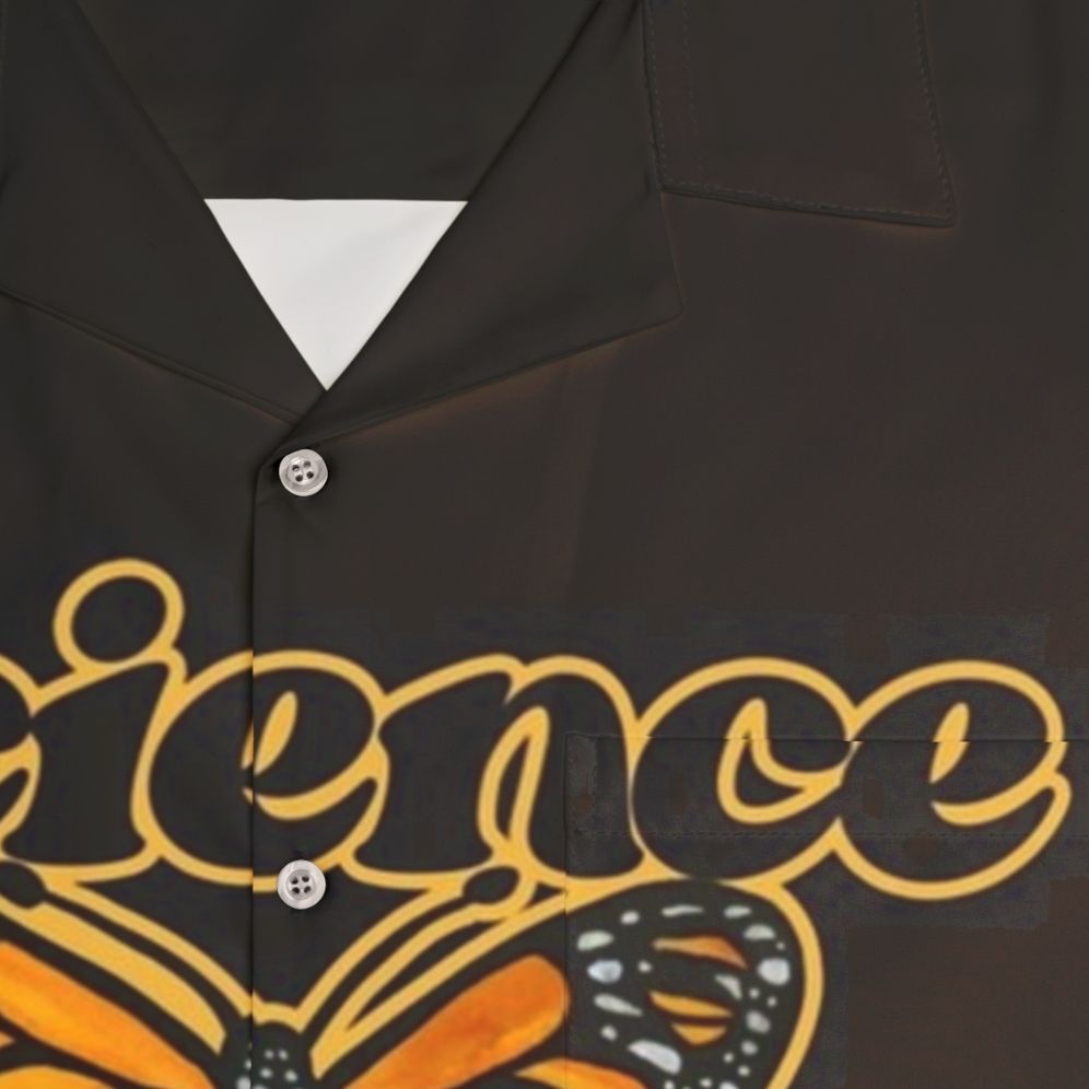 Science teacher wearing a colorful hawaiian shirt with butterfly design - Detail