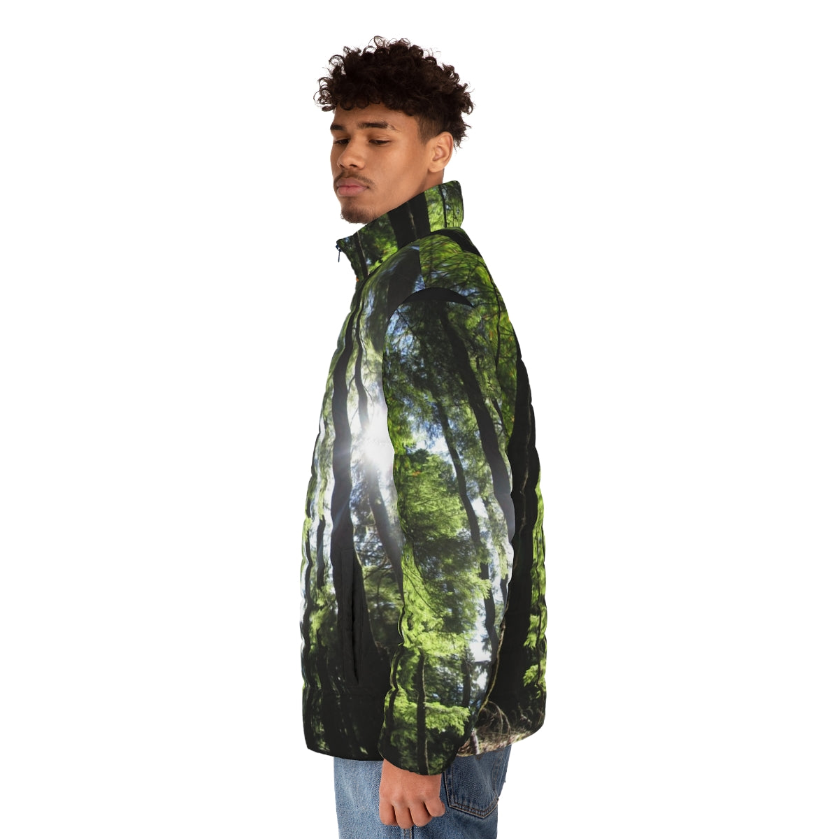 Puffer jacket with a print of sunlit fir trees in a forest - men side left