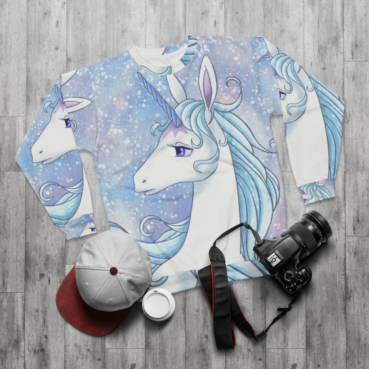 The Last Unicorn pastel-colored sweatshirt featuring a magical unicorn design - flat lay