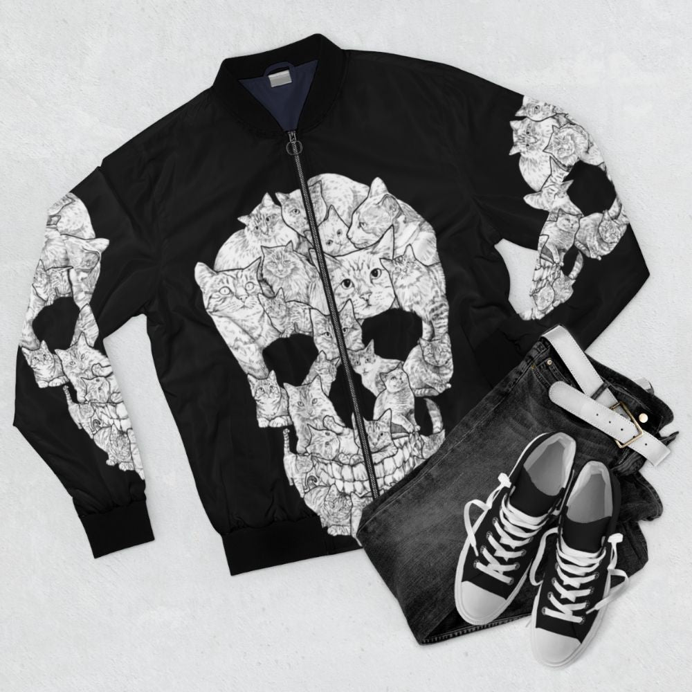 A stylish bomber jacket featuring a fearsome cat skull design, perfect for horror and goth enthusiasts. - Flat lay