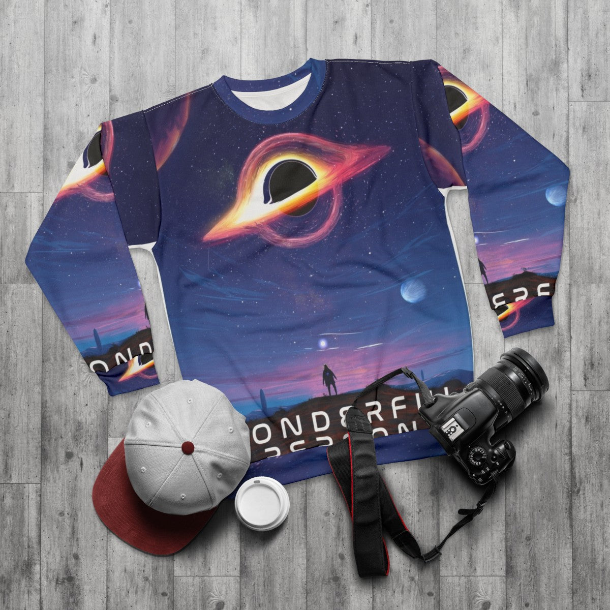 Wonderful person sweatshirt with motivational astronomy and black hole design - flat lay