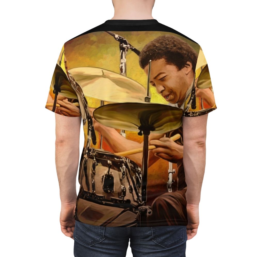 Tony Williams, a renowned jazz drummer, playing the drums. - men back