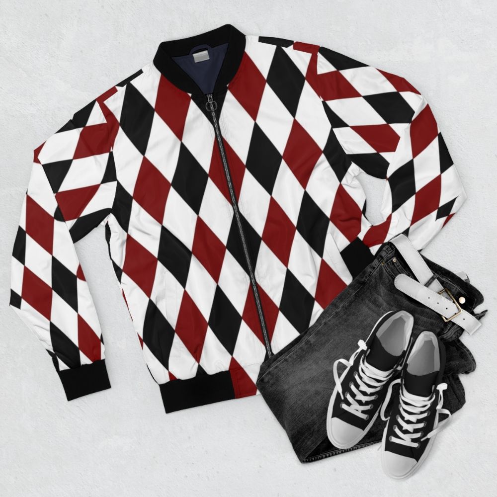 Black, white, and red harlequin diamond pattern bomber jacket - Flat lay