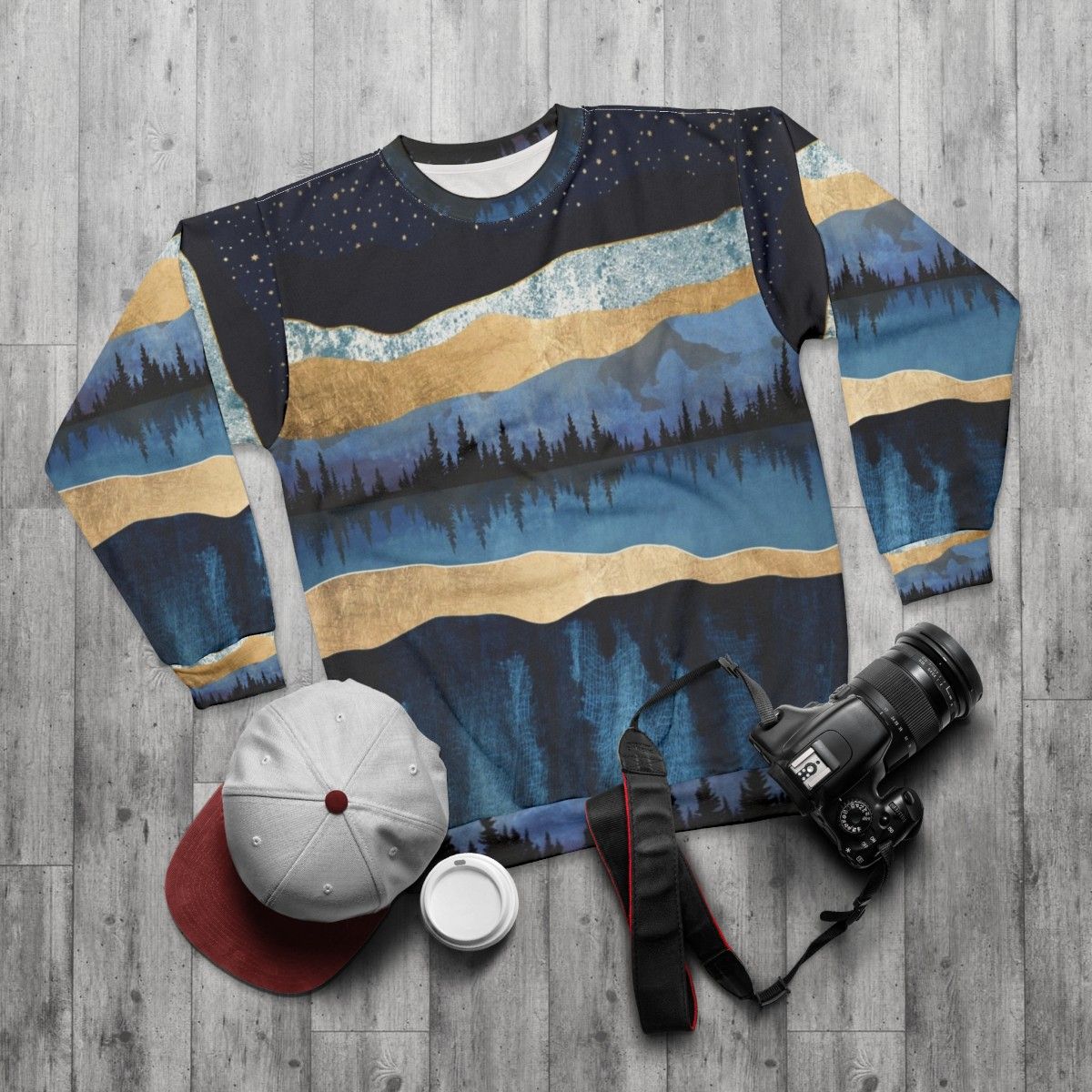 Midnight Lake Sweatshirt with nature landscape and celestial forest design - flat lay