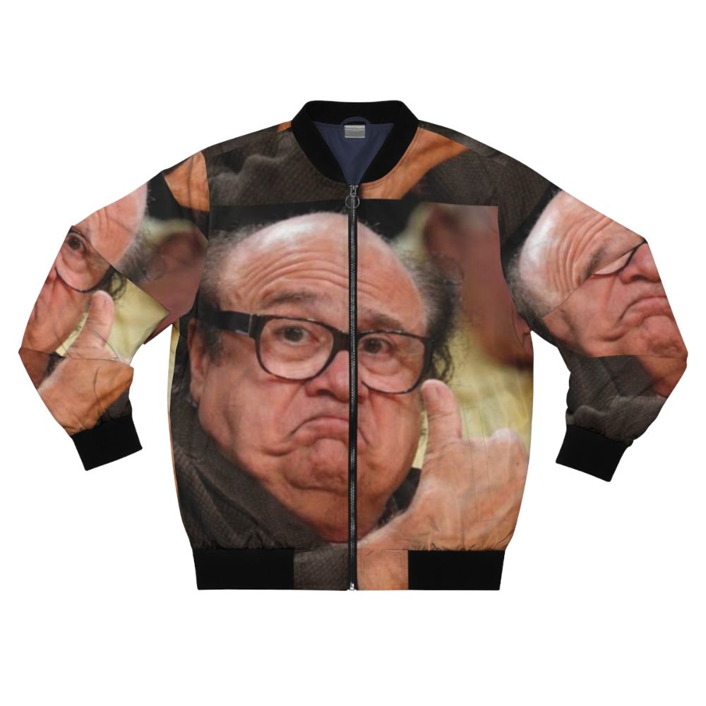 Danny Devito in a bomber jacket, smiling and approving the design