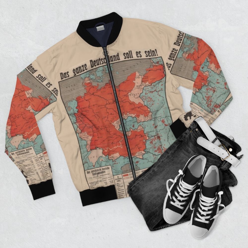 1930s German "Das ganze Deutschland soll es sein!" Bomber Jacket with vintage map and text design - Flat lay