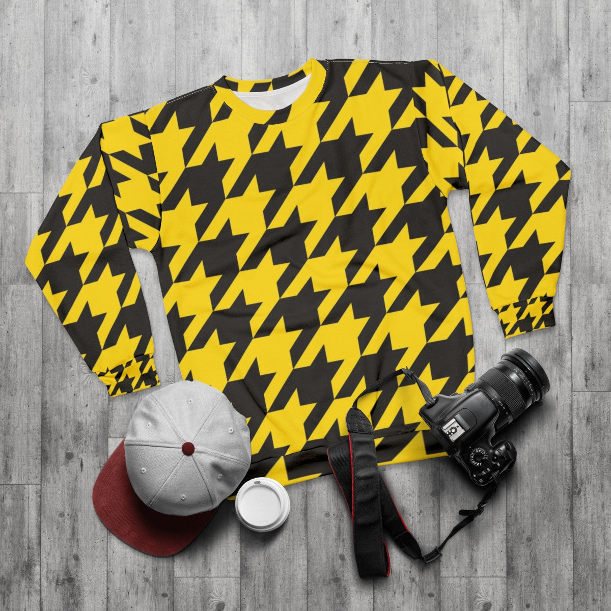 Oversized black and yellow houndstooth sweatshirt - flat lay