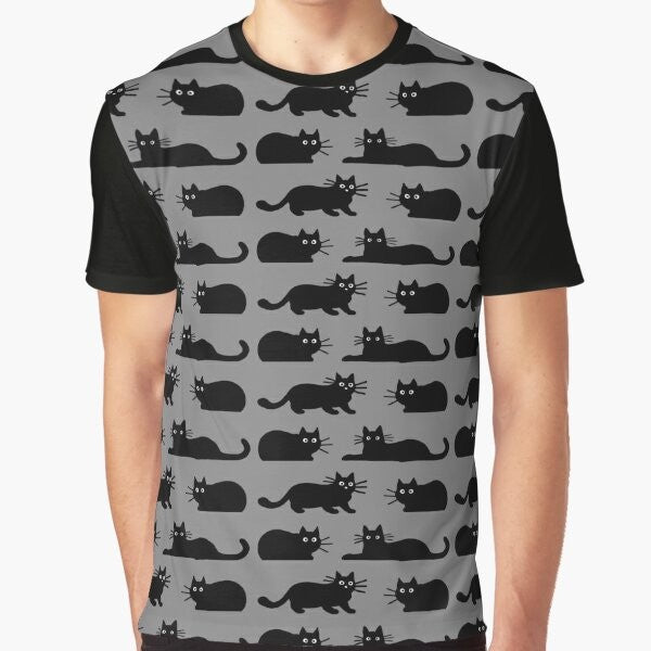 A black cat graphic t-shirt featuring a playful feline design