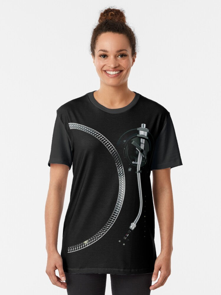 Graphic t-shirt featuring a turntable, tone arm, and platter design - Women