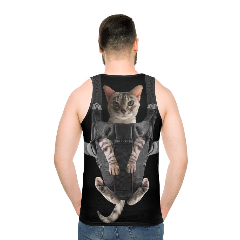 Funny cat in baby carrier - men back