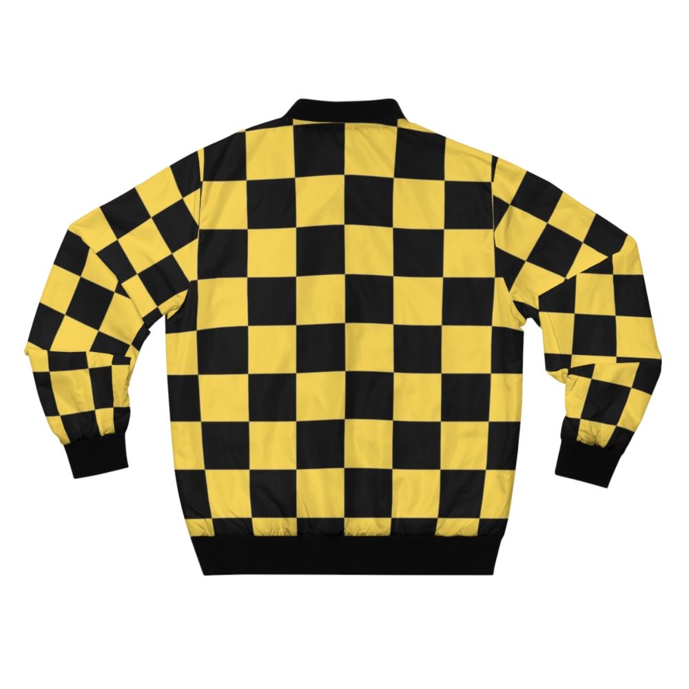 A black and yellow checkered bomber jacket with a geometric, patterned design. - Back