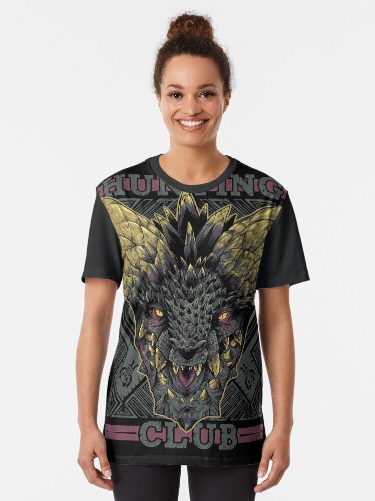 Nergigante, the Elder Dragon from Monster Hunter World, featured on a Hunting Club graphic t-shirt - Women