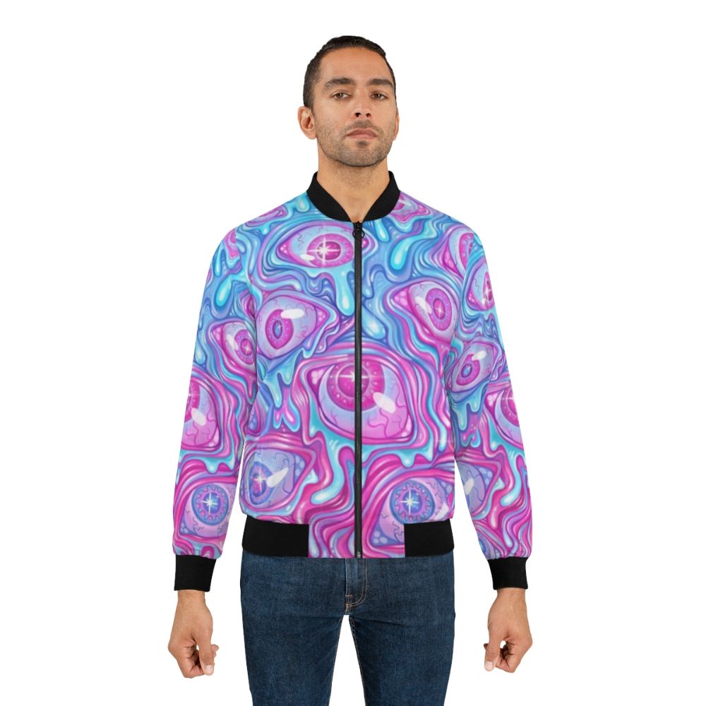 A colorful and creepy bomber jacket with an eyeball pattern design. - Lifestyle