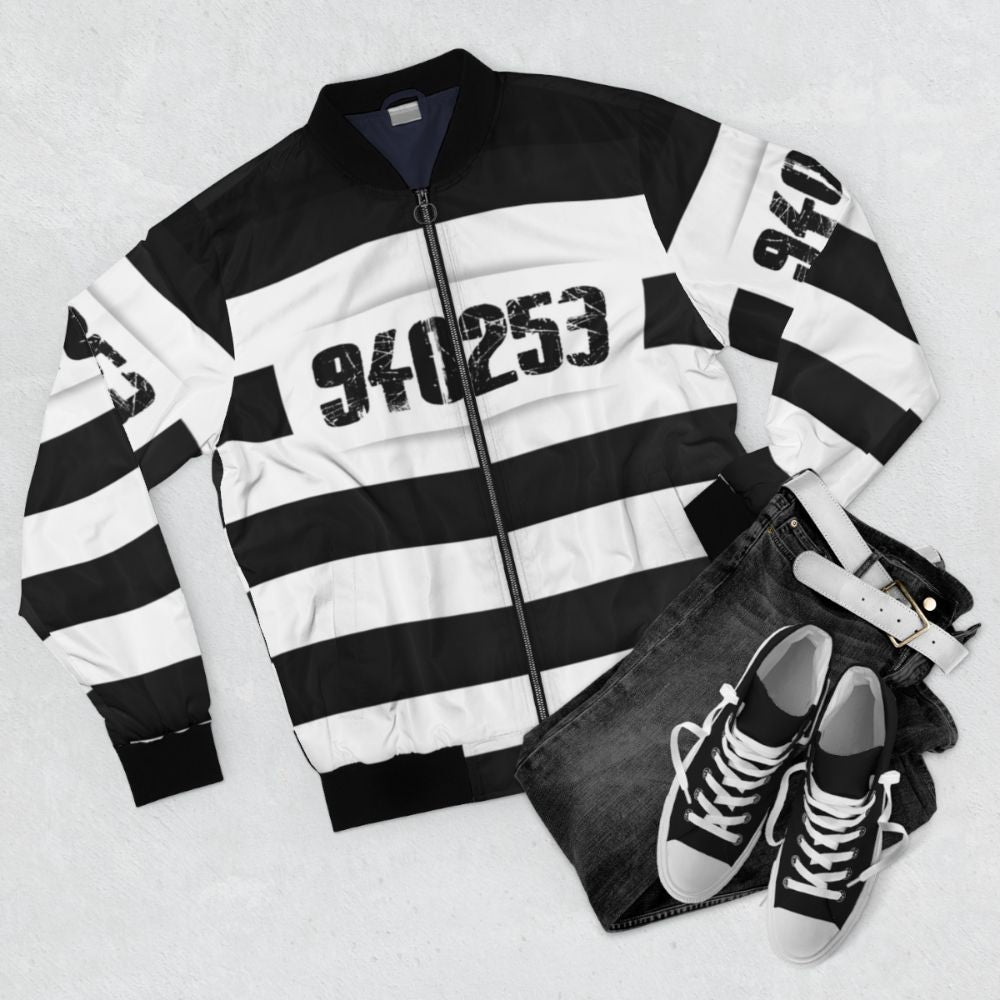 Prison stripes bomber jacket, a funny Halloween costume for inmates and bad guys. - Flat lay