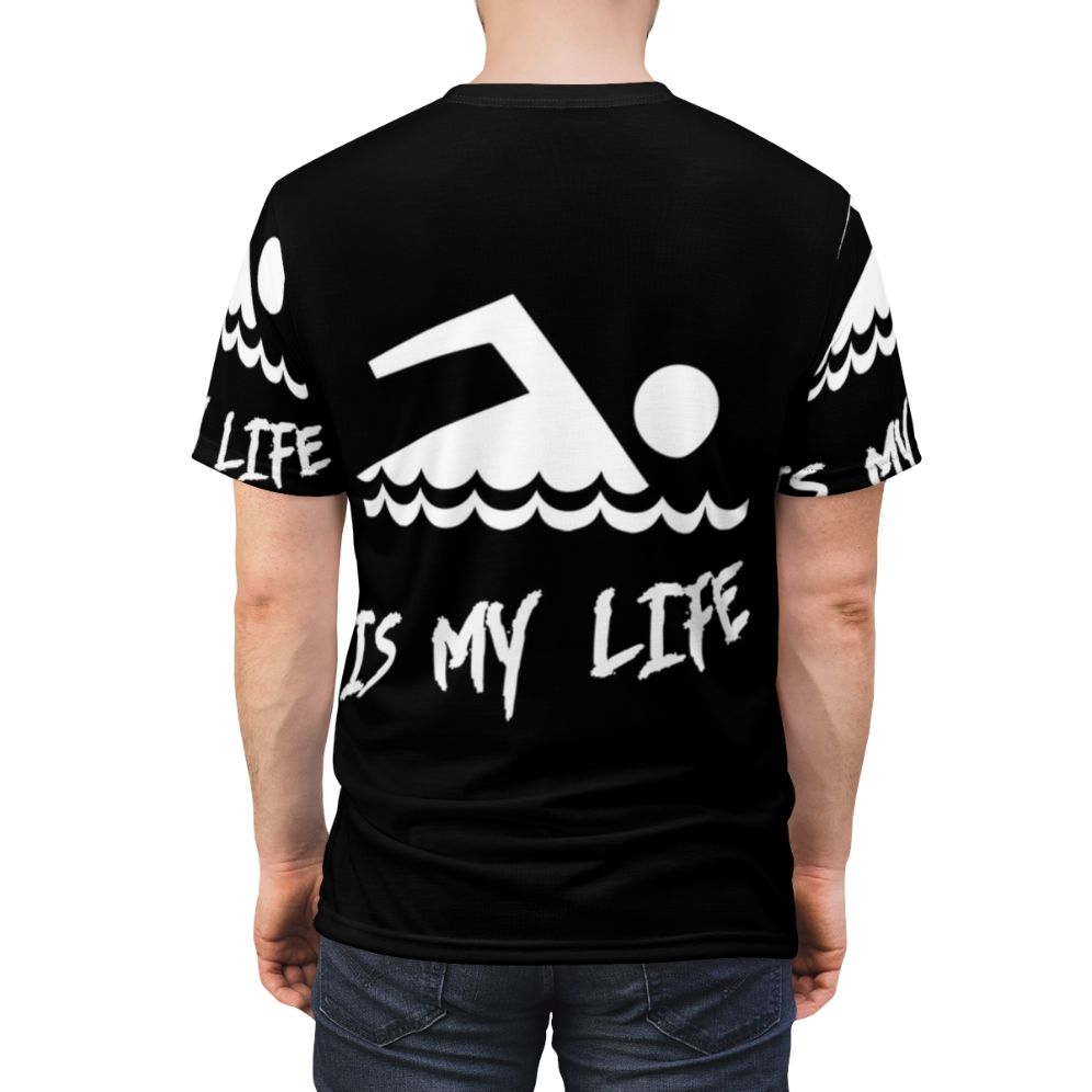 A person wearing a T-shirt with the design "Swimming Is My Life" - men back