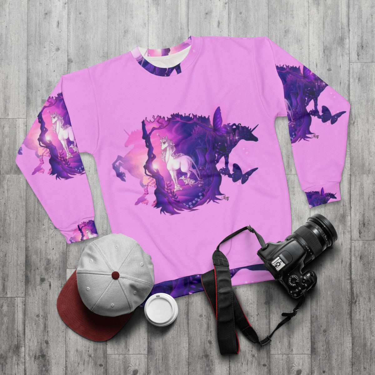 The Last Unicorn Sweatshirt featuring the mythical creature Amalthea - flat lay