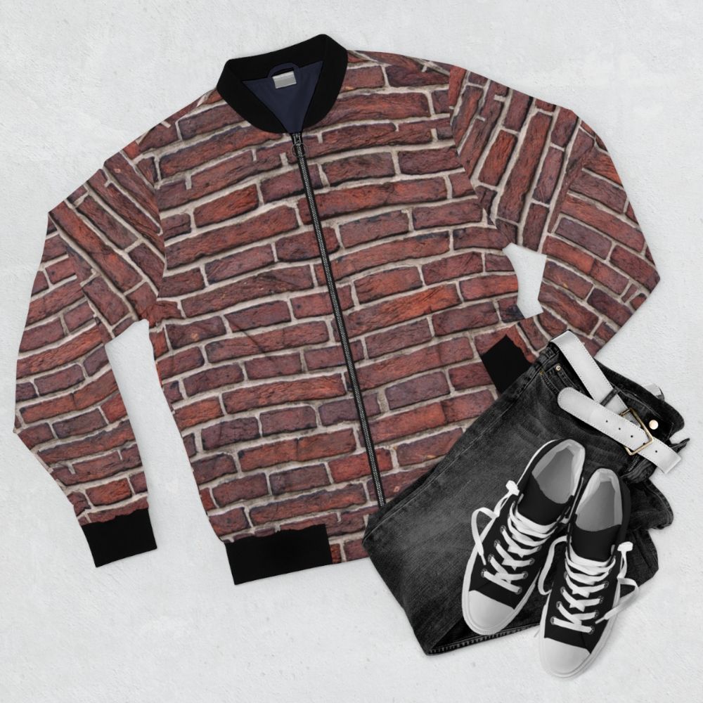 A bomber jacket with a textured brick wall design, showcasing an industrial and architectural style. - Flat lay