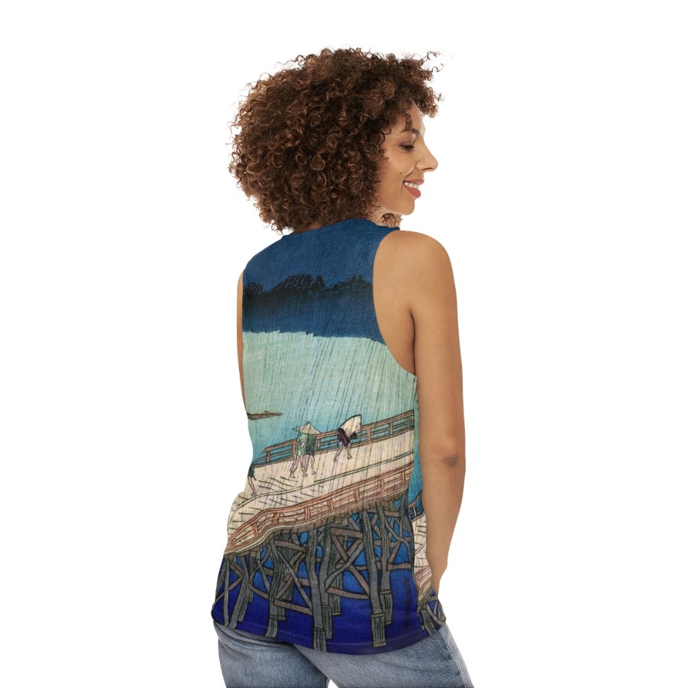 Unisex tank top featuring the Japanese ukiyo-e artwork "Sudden Shower Over Shin Ohashi Bridge" by Hiroshige - women back