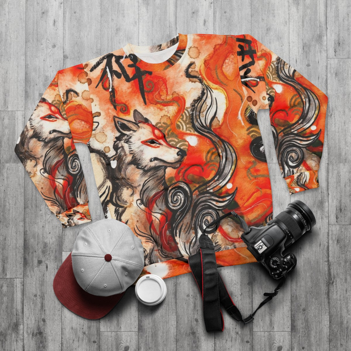 Okami Amaterasu inspired sweatshirt featuring a wolf-themed ink wash painting design - flat lay