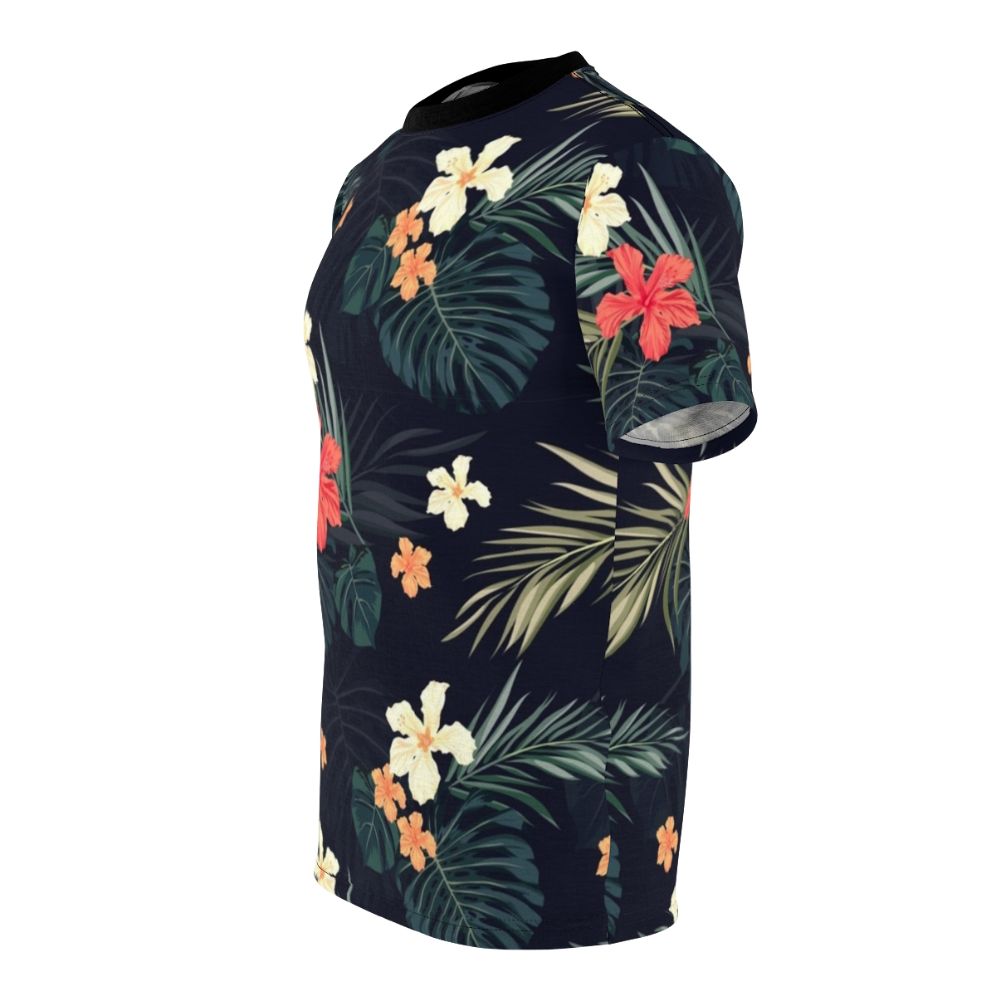 Model wearing a dark t-shirt featuring a tropical floral pattern design. - men left