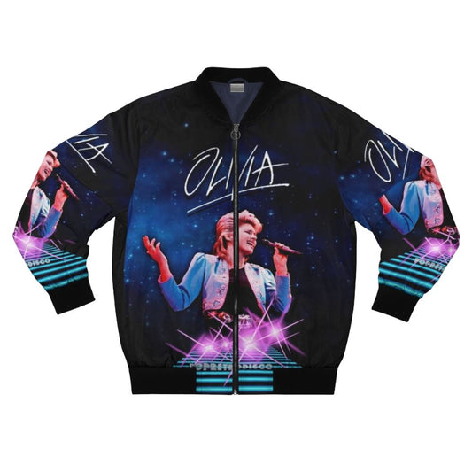 Olivia Newton-John wearing a blue bomber jacket with a retro 1980s music design