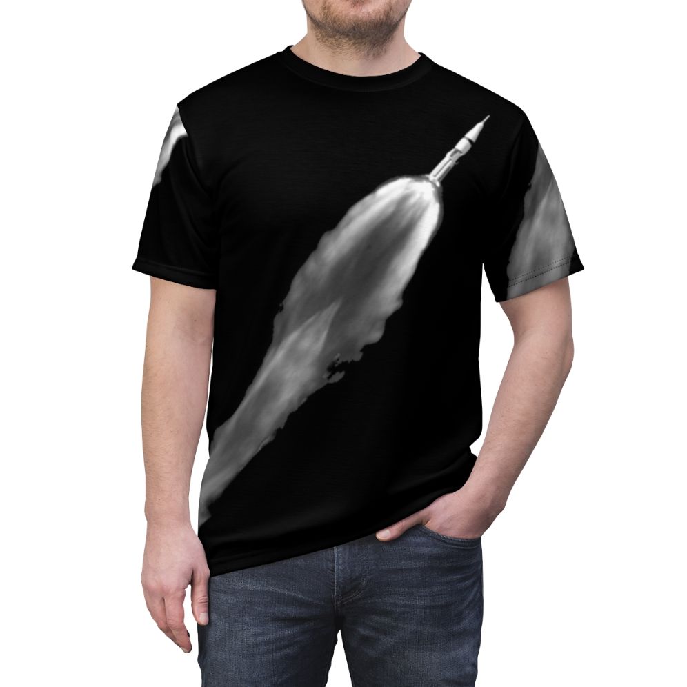 Space-themed graphic t-shirt design featuring a rocket launch - men front