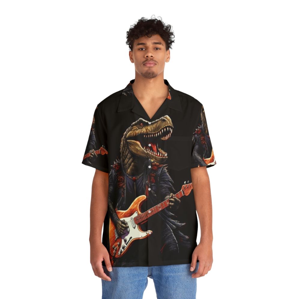 Dinosaur playing guitar graphic on a colorful Hawaiian-style shirt - People Front