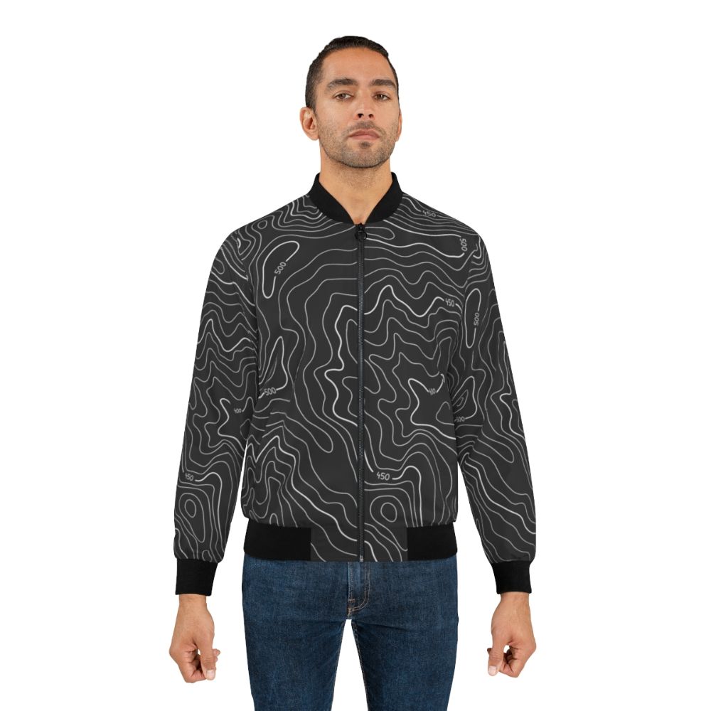 Topography bomber jacket with modern, minimalist geographical design featuring contour lines and black and white color scheme - Lifestyle