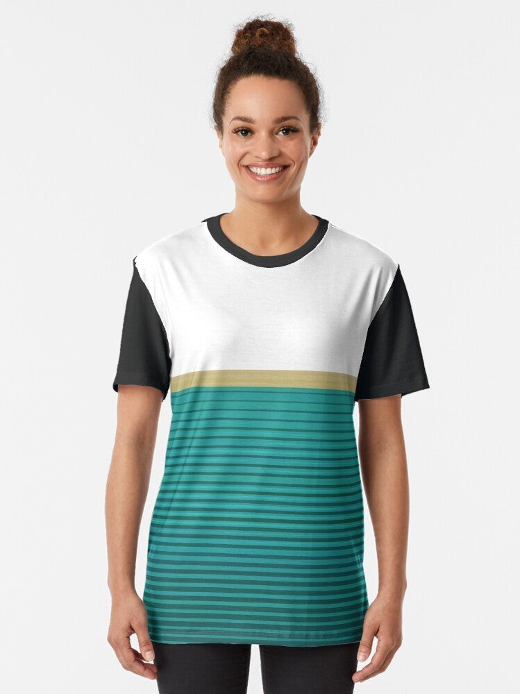 Graphic t-shirt featuring an abstract design in teal, gold, and black colors, with a "Alive with Pleasure Hopefully" text element. - Women