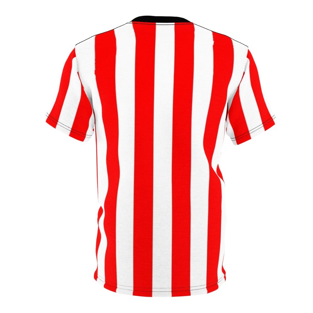 A person wearing a red and white vertical striped t-shirt with a minimalist, geometric pattern design. - Back