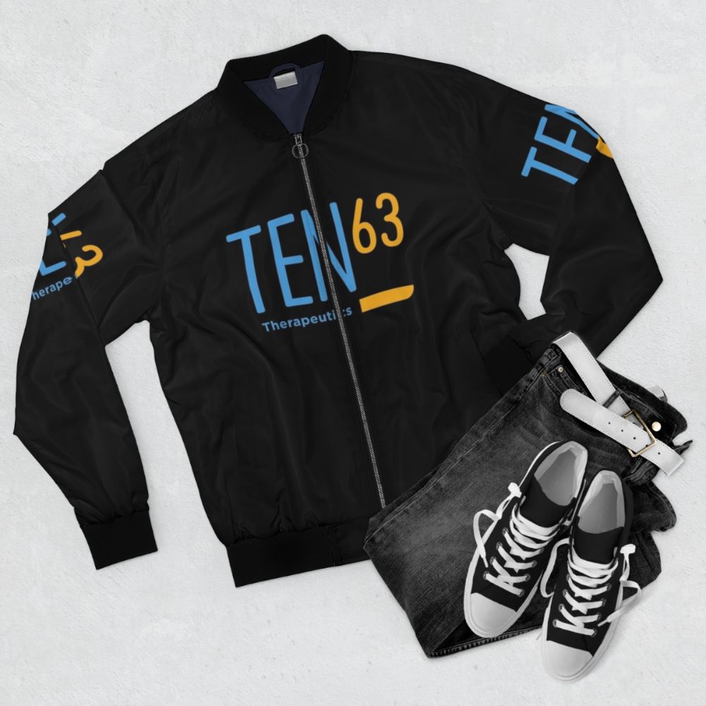 Vintage-inspired bomber jacket in Ten63 original colors with a dark background - Flat lay