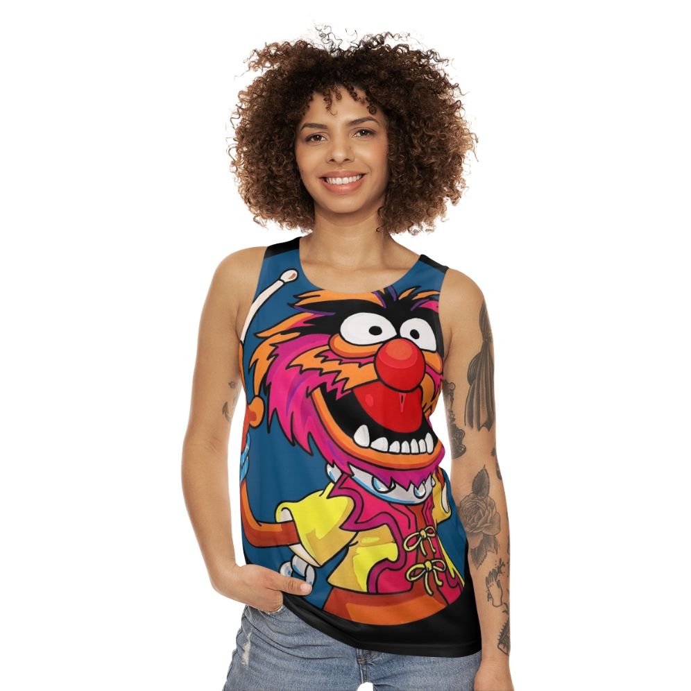 Electric Mayhem drummer playing drums on a unisex tank top - women