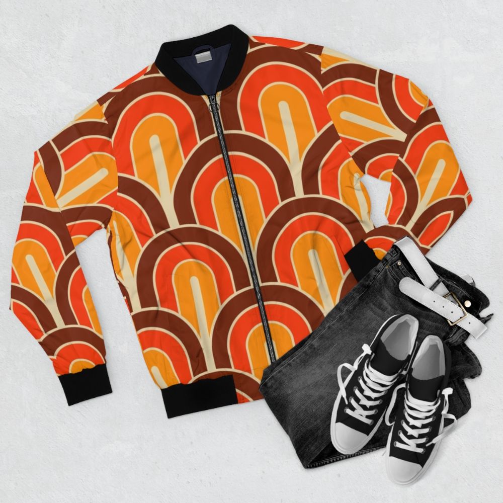 Retro geometric bomber jacket with a mix of square and circle patterns in a colorful, 60s 70s fashion style. - Flat lay