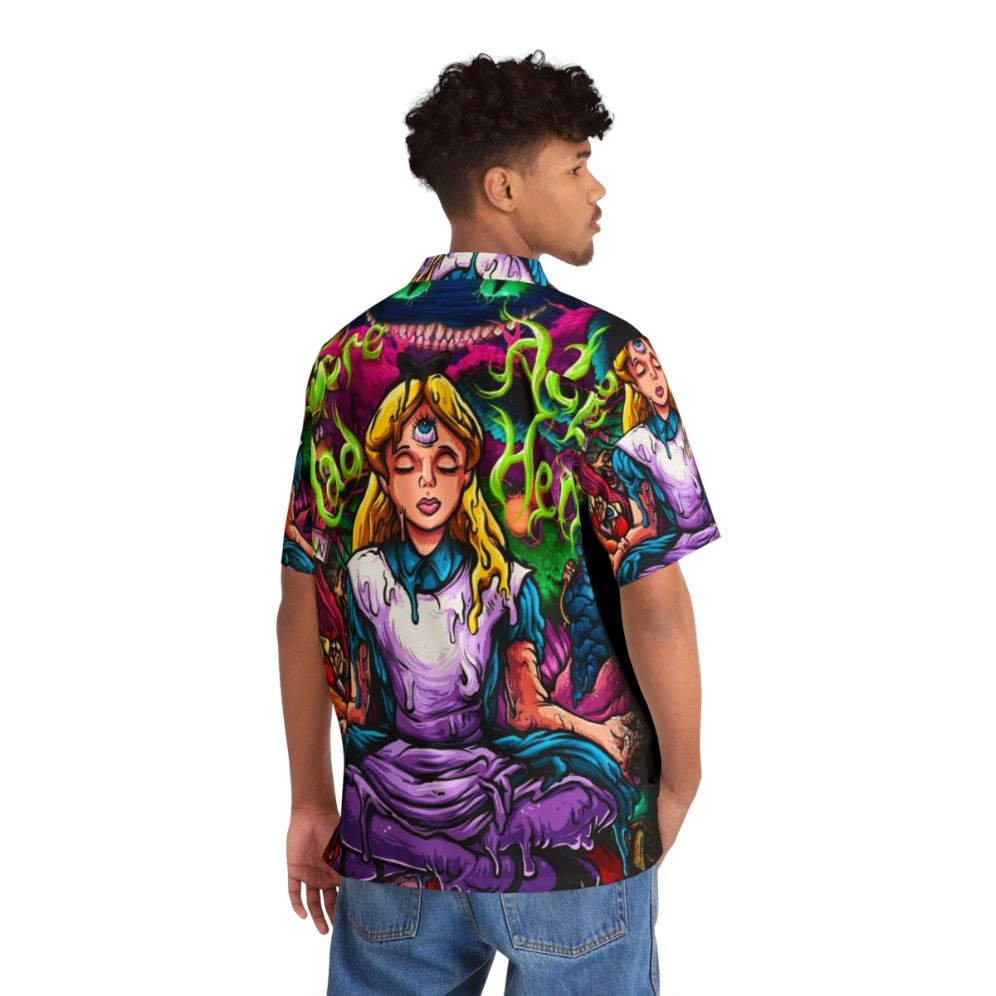 Alice in Wonderland inspired Hawaiian shirt with trippy, psychedelic design - Flat lay