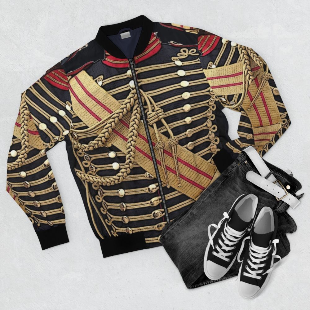 Blue military-style bomber jacket with gold trim, a simulated uniform design - Flat lay