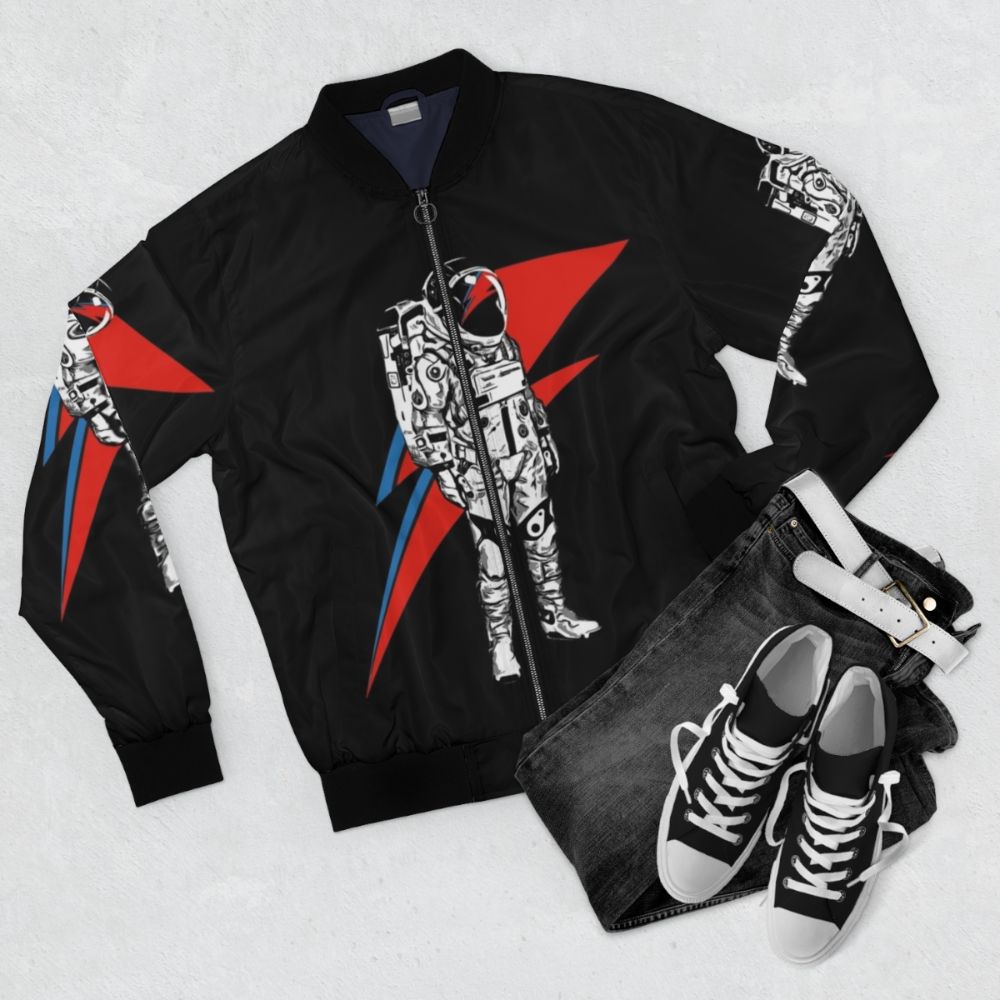 Bowie inspired bomber jacket with Ziggy Stardust and Goblin King graphics - Flat lay