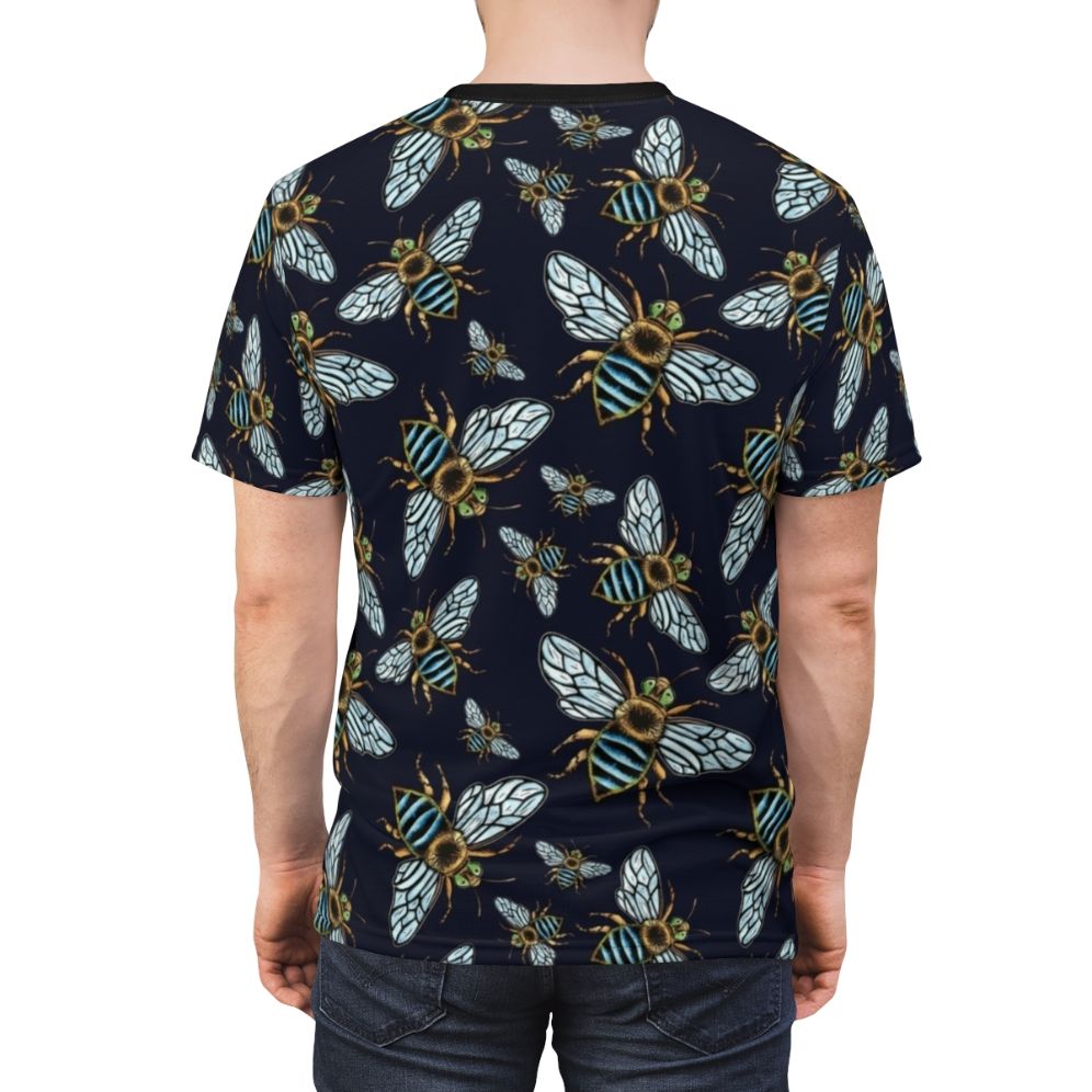 Model wearing a blue banded bee lino print t-shirt, a nature-inspired graphic design - men back