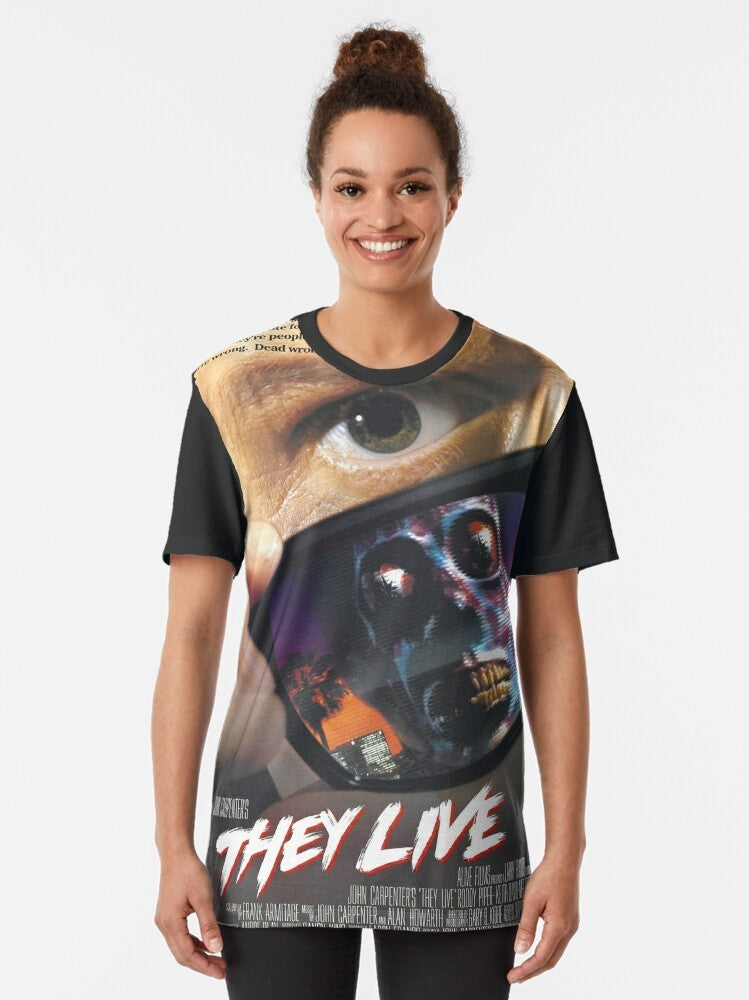 They Live! Sci-Fi Graphic T-Shirt featuring a retro movie poster style design with aliens and human figures - Women