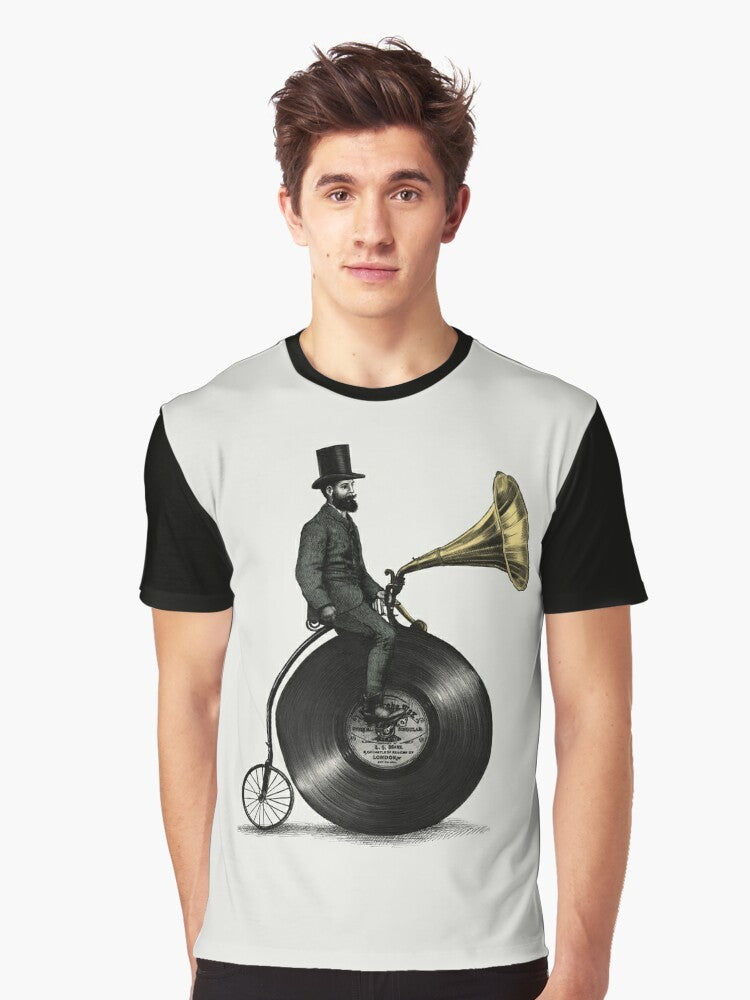 Vintage-inspired graphic t-shirt with music and cycling motifs, featuring a man with a top hat, beard, and moustache riding a penny farthing bicycle. - Men