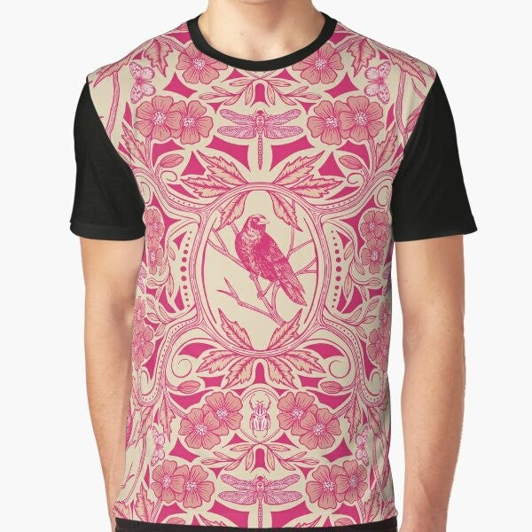 Detailed floral graphic featuring a crow and dragonfly in vibrant hot pink, red, and cream colors on a graphic t-shirt.