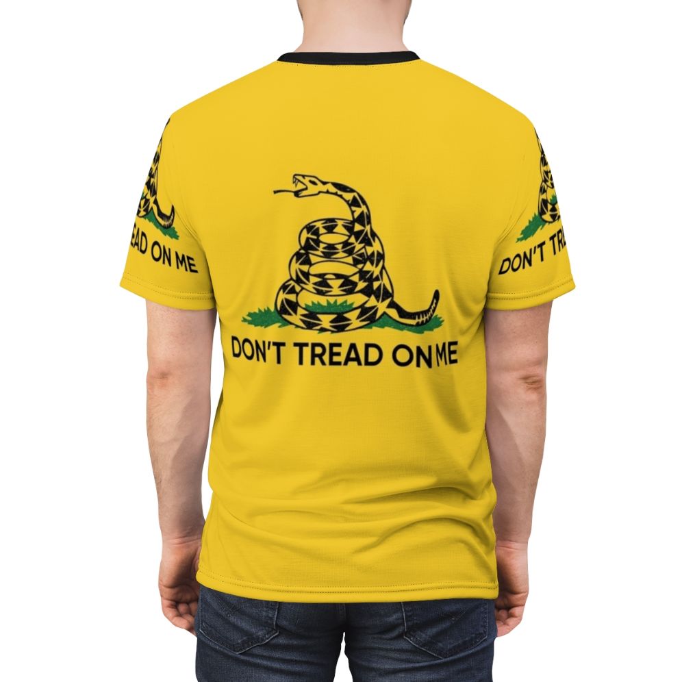 Patriotic "Don't Tread on Me" graphic printed on a high-quality t-shirt. - men back