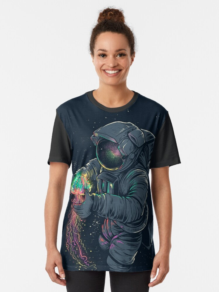 Psychedelic space jellyfish graphic design on a t-shirt featuring an astronaut exploring the cosmos - Women