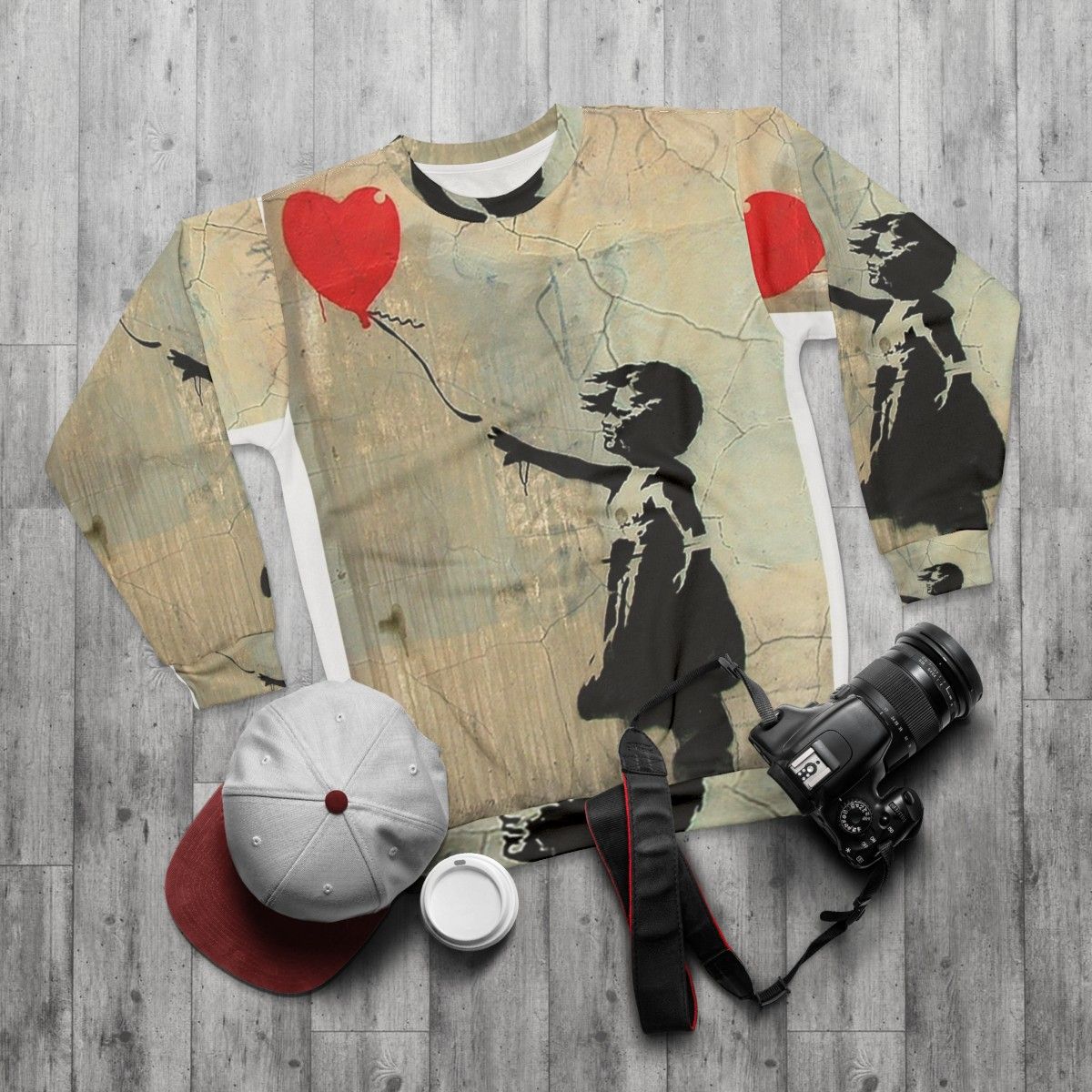 Banksy-inspired red heart balloon women's sweatshirt - flat lay